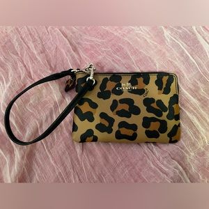 Leopard print Coach wristlet.